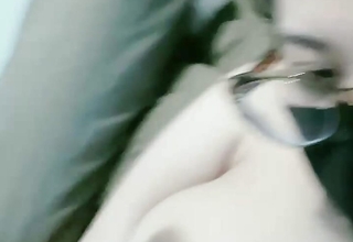Girl stroking with a left-wing dildo