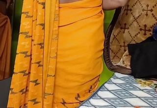 Indian beautiful bhabhi removing her sari.