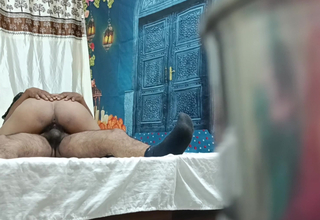 Muslim matriarch with neighbour