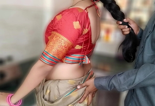 Amazing Indian bhabhi's first steamy kitchen encounter with devar, featuring tight desi curves and sharp-witted passion in a viral video.