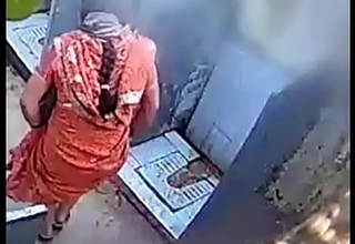 Desi bhabhi pissing in open toilet