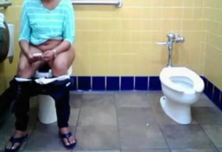 Desi Nri Aunty Caught Pissing In Toilet