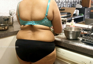 Broad in the beam Bristols Bhabhi in the Scullery wearing panties with the addition of bra