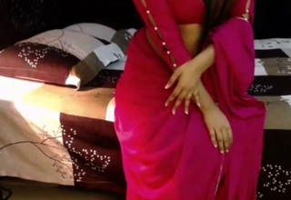 Low-spirited Indian girl sexy dance in saree