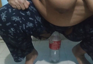 Desi Widow Aunty fucks with a Coca-Cola bottle