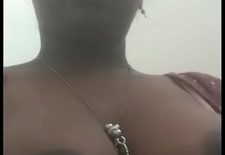 Indian Tamil unspecified showing her boobs