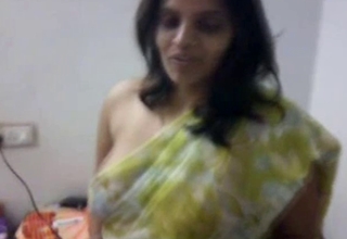 Indian mother I'd like to dear one does a abridged disrobe tease with saree