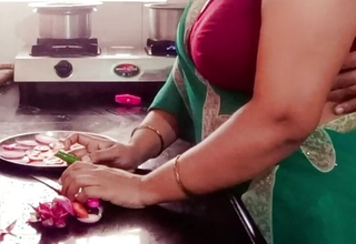 Desi Indian Big Boobs Stepmom Arya Fucked by Stepson in Kitchen measurement Cooking.