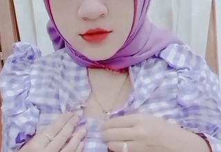 Kuala Lumpur Woman's Viral Purple Hijab Squeezes Her Bra buddies and Masturbates