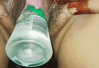 Sister-in-law inserted the whole bottle just about the pussy